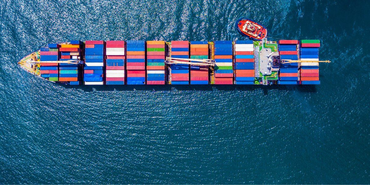 Container ship at sea seen from above