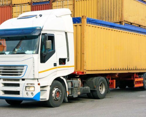 Truck carrying a shipping container
